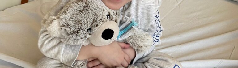 A cuddly bear helps Link face Christmas in hospital
