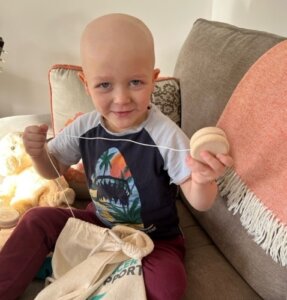 Samuel loves the yo-yo that came in his Kids' Cancer Kit