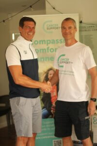 Left, Olly Johnson (TDLTC Chairman), right Mark Guymer CEO Cancer Support UK 