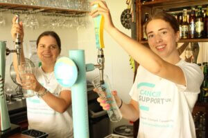 Daisy Auckett and Amelie Davies (TDLTC bar staff supporting Cancer Support UK)