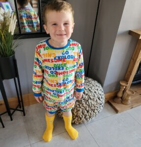 Reid loves his Kid's cancer Kit especially the yellow minion socks