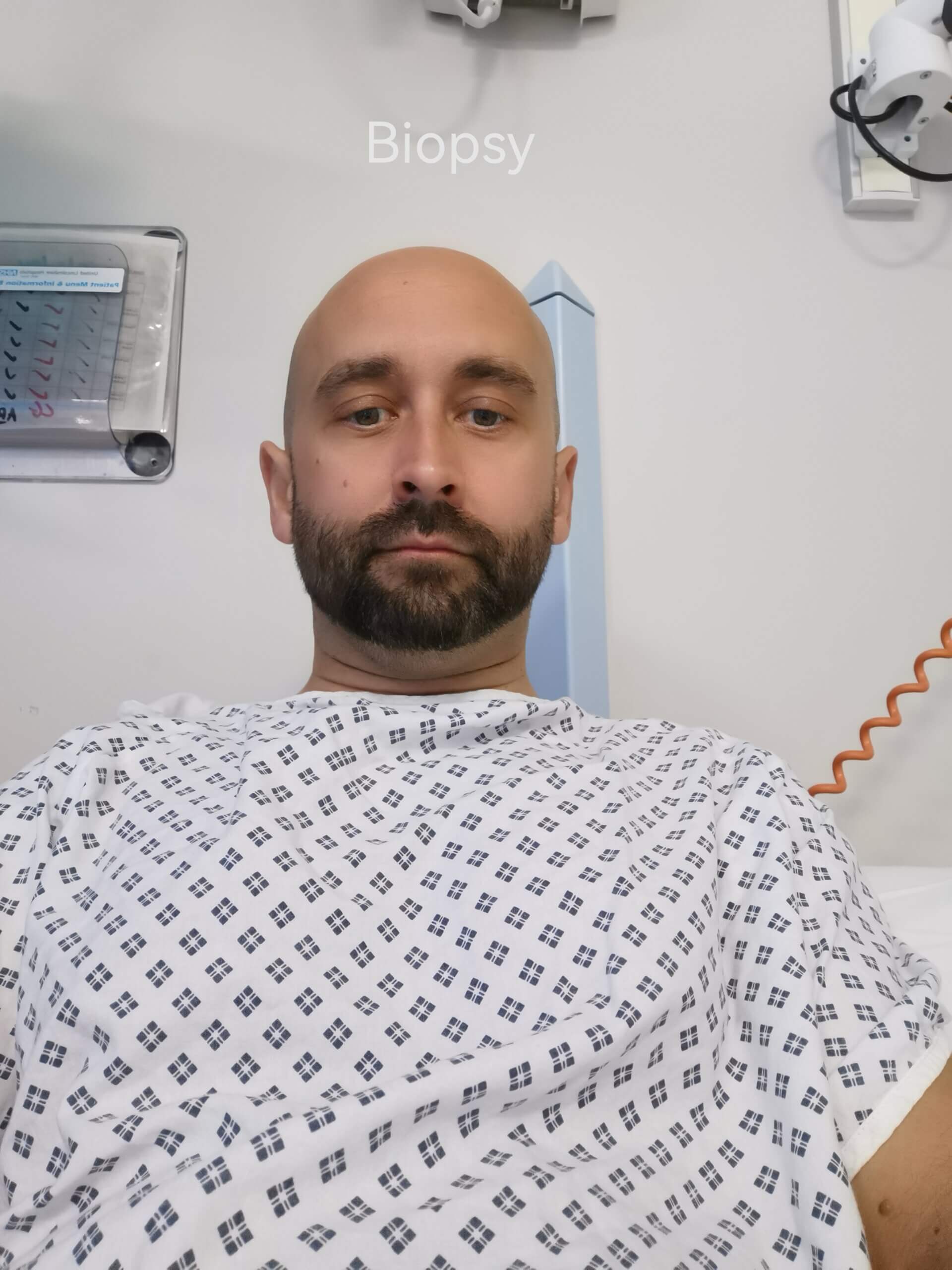 Man in hospital gown