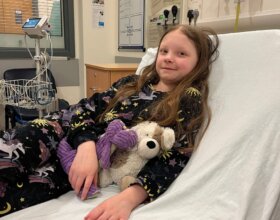 Girl in hospital bed