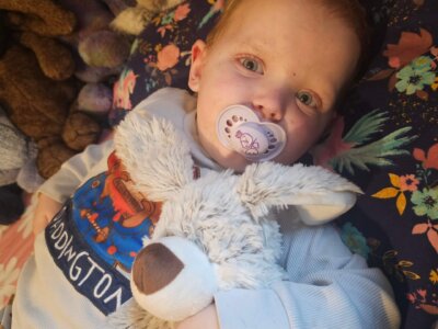 Tanwen with Warmies Bear